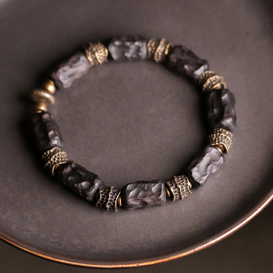 Black Ebony and Brass Bracelet Symbolizing Prosperity